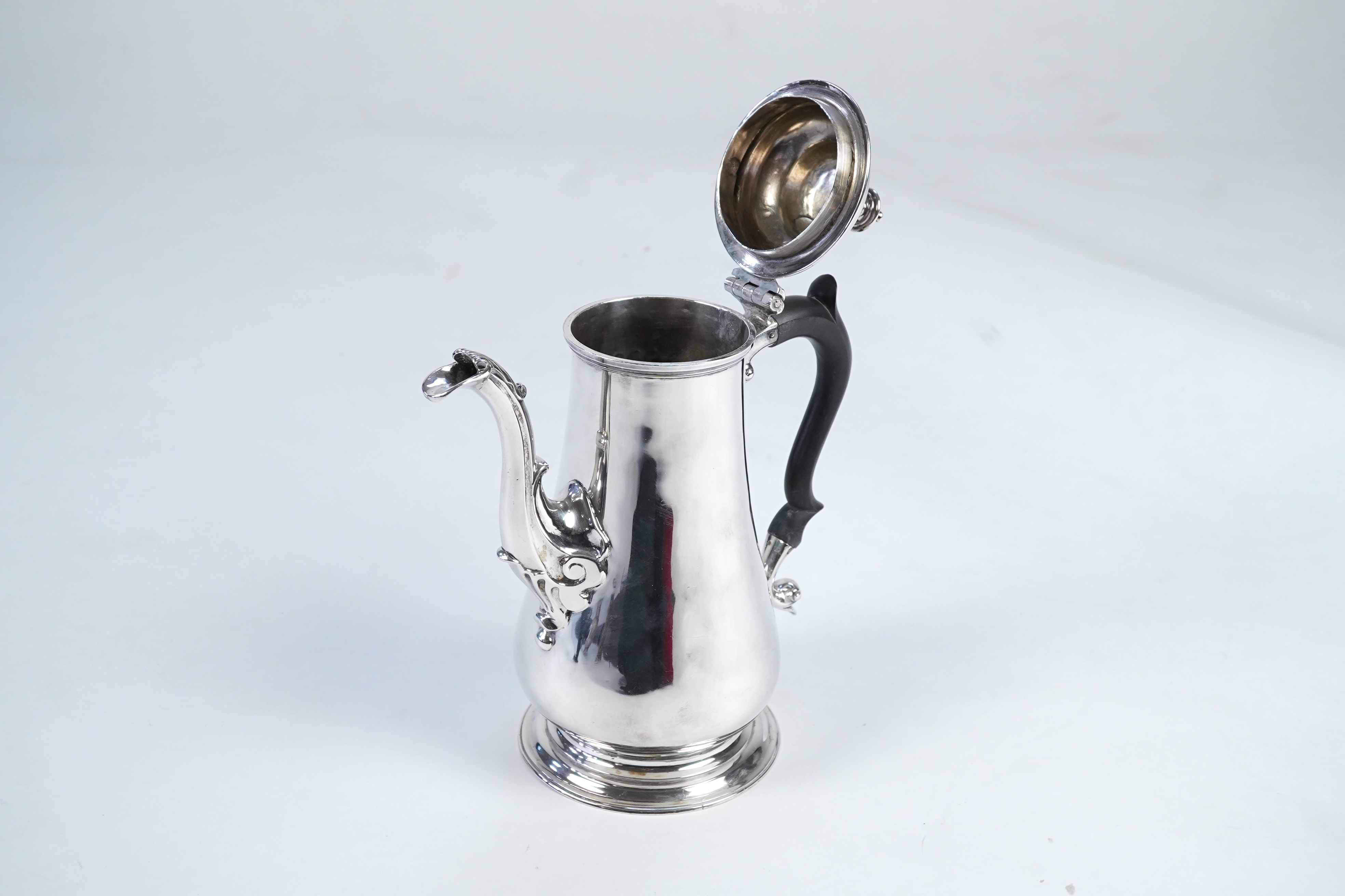 A late George II silver coffee pot, by William & Robert Peaston